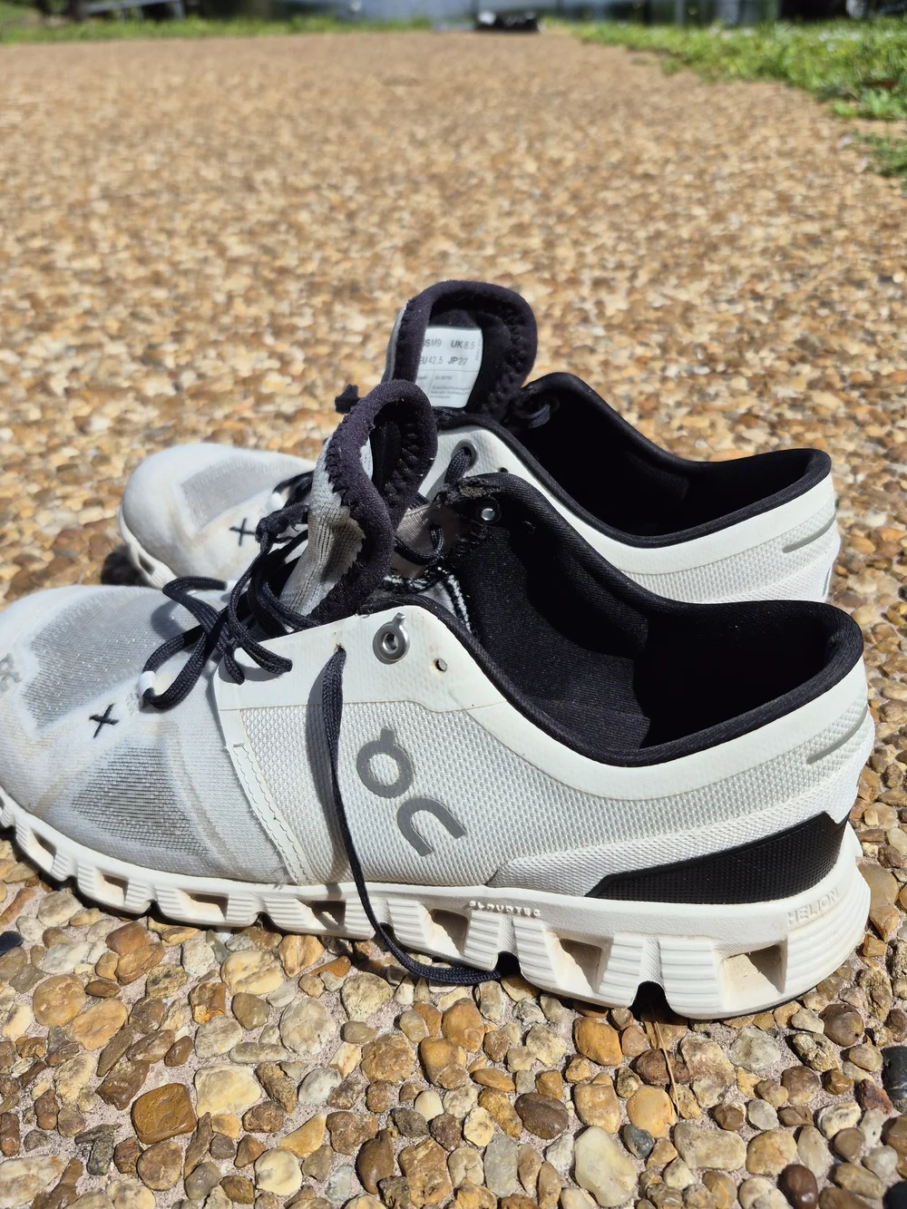 On Running Men’s Cloud Athletic Sneakers in White and Black